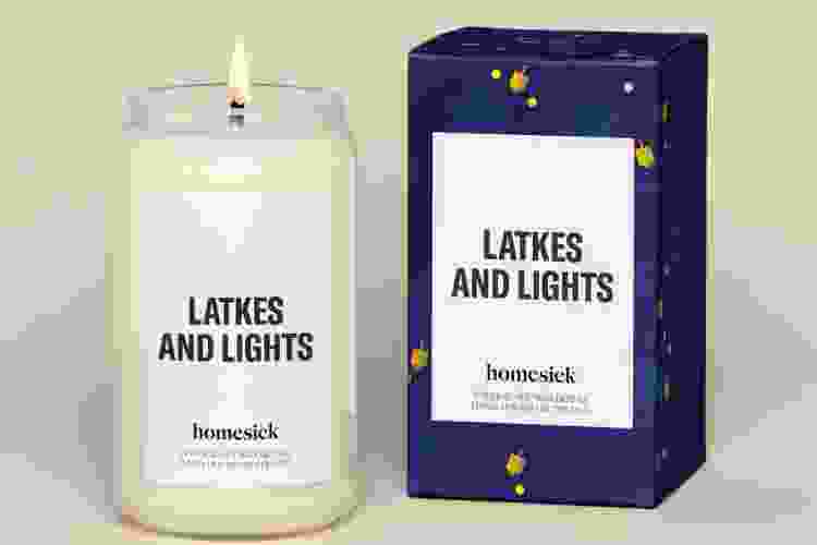 homesick candle that reads lights and latkes on the label