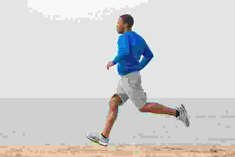 man running on the beach