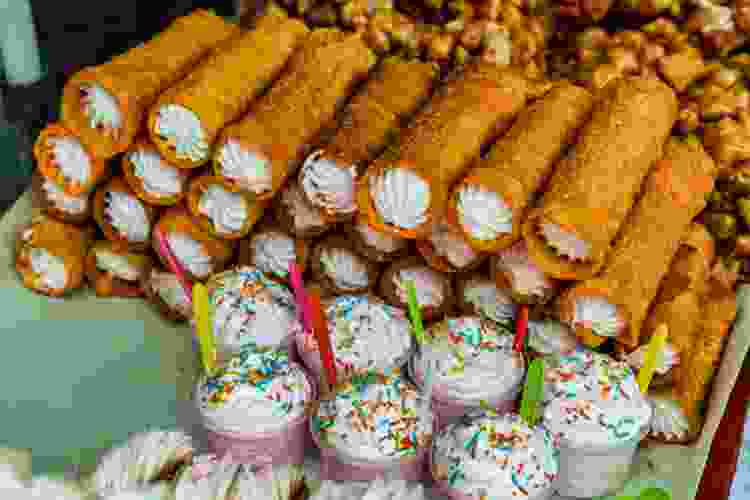 table filled with traditional Mexican desserts