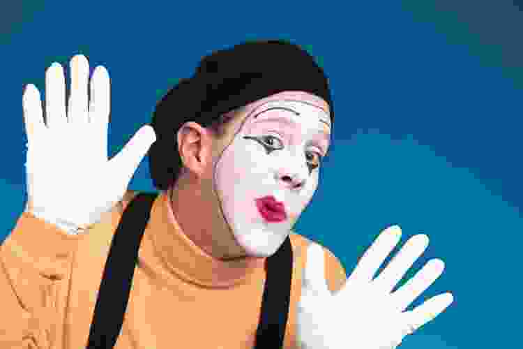 mime with makeup and white gloves