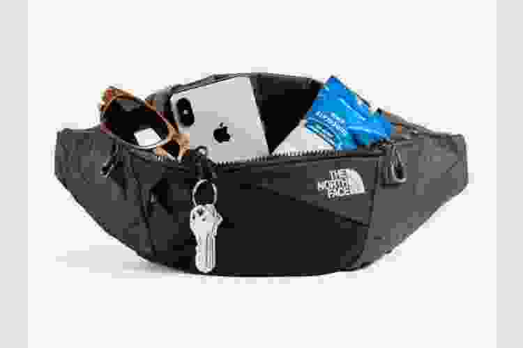 northface belt carrying keys, sunglasses, coins, etc.