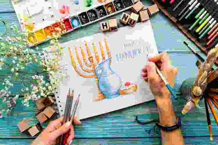 painting menorah in hanukkah art class