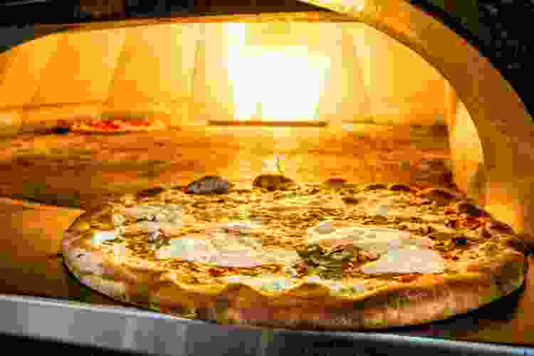 Patsy's Pizzeria Manhattan pizza in coal-fired oven