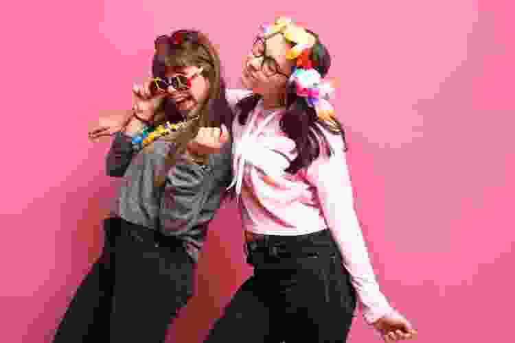 teen girls posing for photo booth