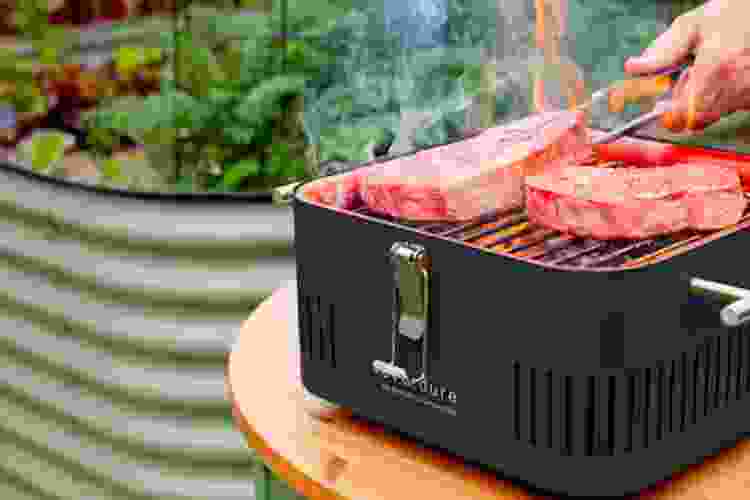 https://www.lowes.com/pd/EVERDURE-CUBE-115-Sq-in-Graphite-Painted-Portable-Charcoal-Grill/5014524947