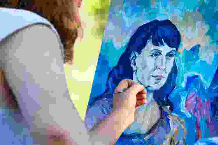 painting blue portrait of woman's face