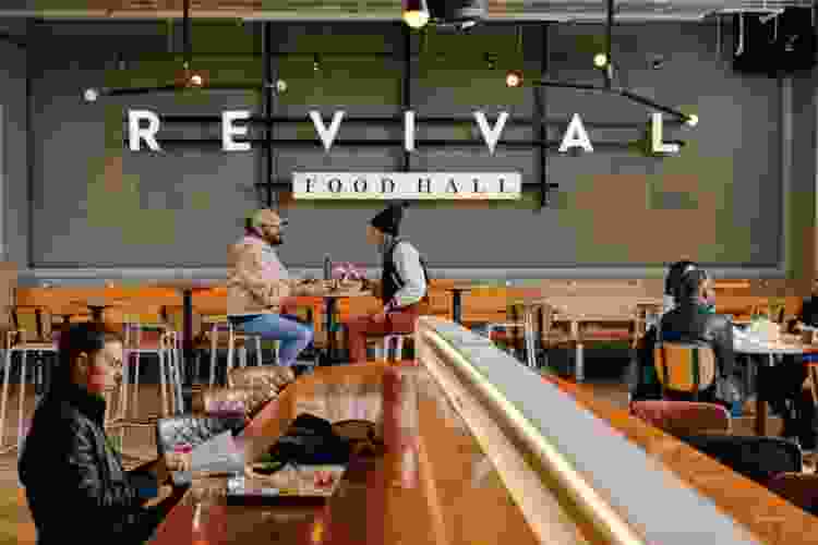 people dining at revival food hall in Chicago