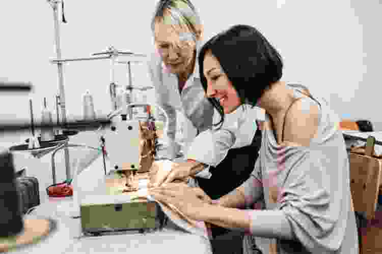 women sewing in fashion studio