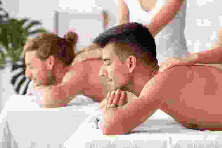 couple getting massages at the spa