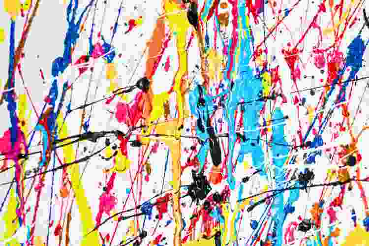 splatter paint on white canvas as a cute painting idea with friends