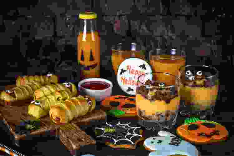 Halloween-themed snacks on party table