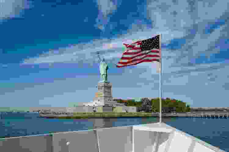 view of the statue of liberty by boat