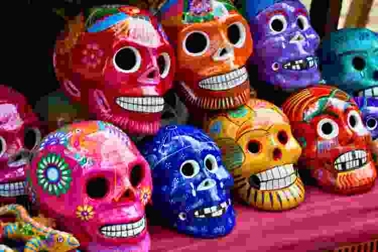 set of brightly painted sugar skulls for dia de los muertos