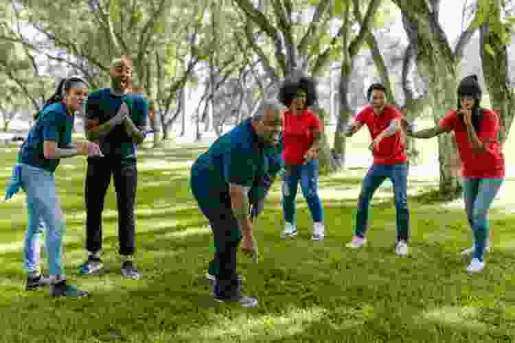 team playing games in park