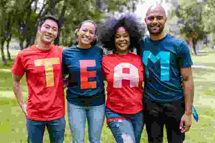 coworkers wearing matching team shirts