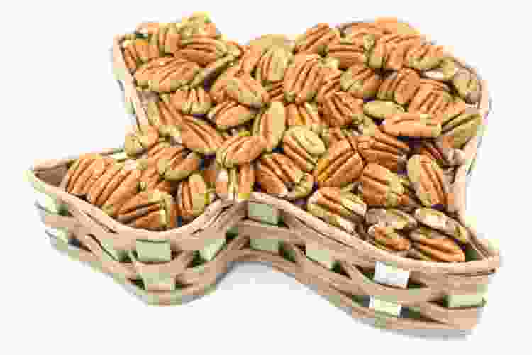 Texas pecans displayed in Texas-shaped basket