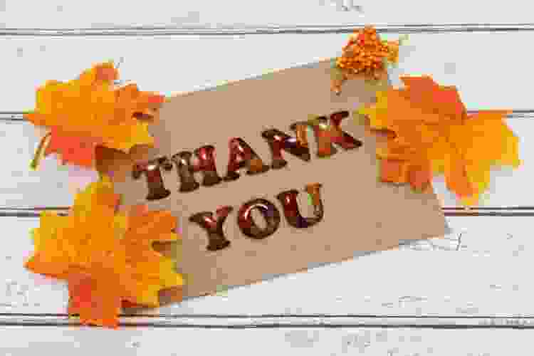 thank you card surrounded by fall leaves