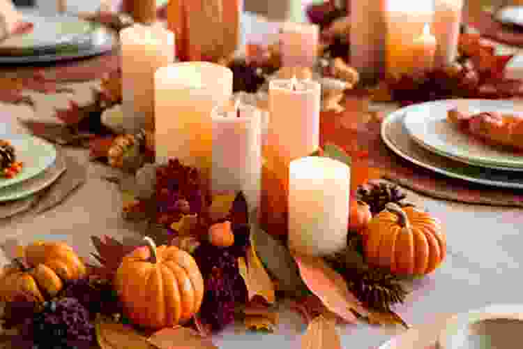 Use candles as Thanksgiving table decor.