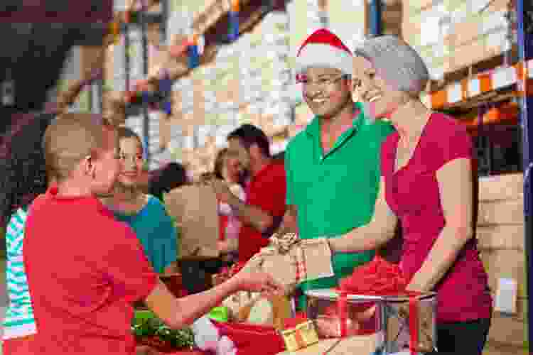 volunteers helping at toy drive as a Christmas team building activity