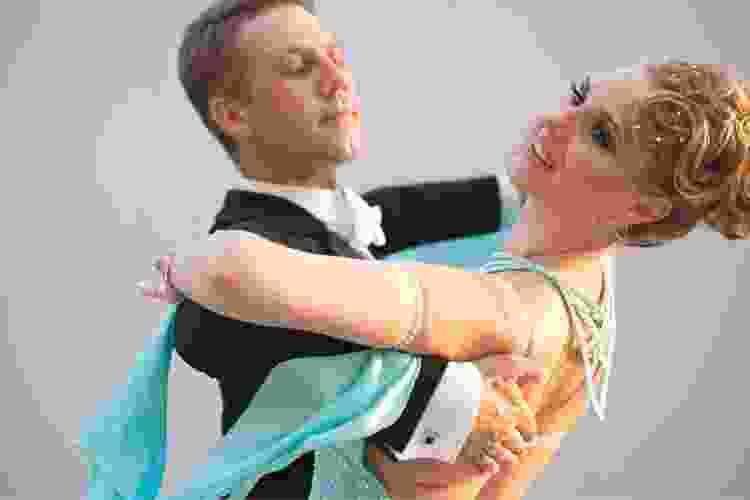 couple in formal wear ballroom dancing