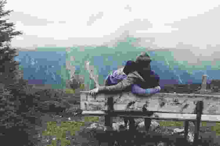 couple overlooking scenic mountain view