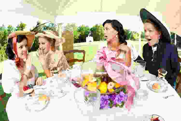 women dressed in vintage tea party attire