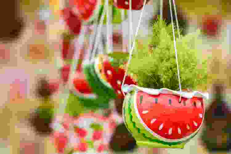 hanging flower pot painted like a watermelon