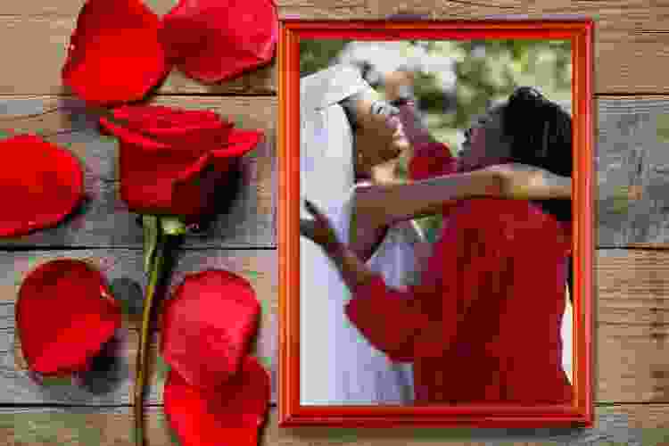 wooden frame with photo of mother and daughter on her wedding day