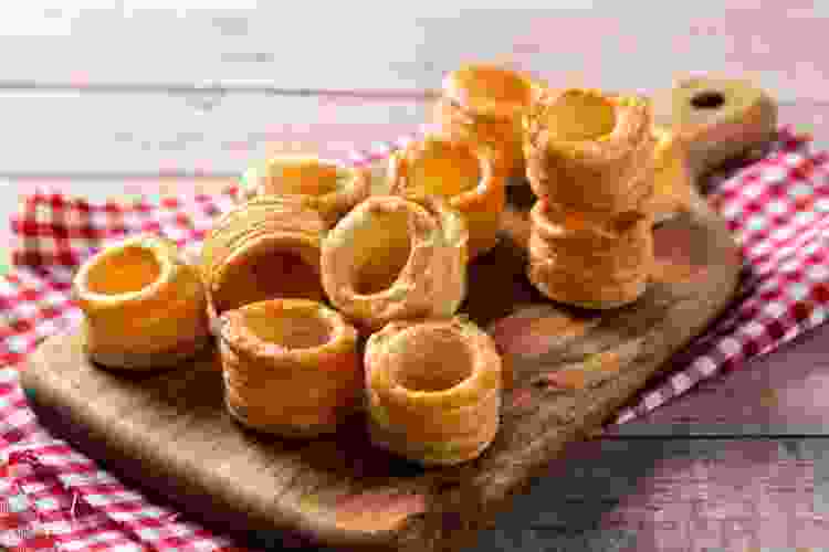 Yorkshire pudding on wooden cutting board