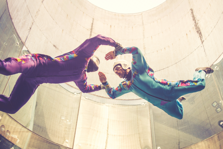 man at indoor skydiving