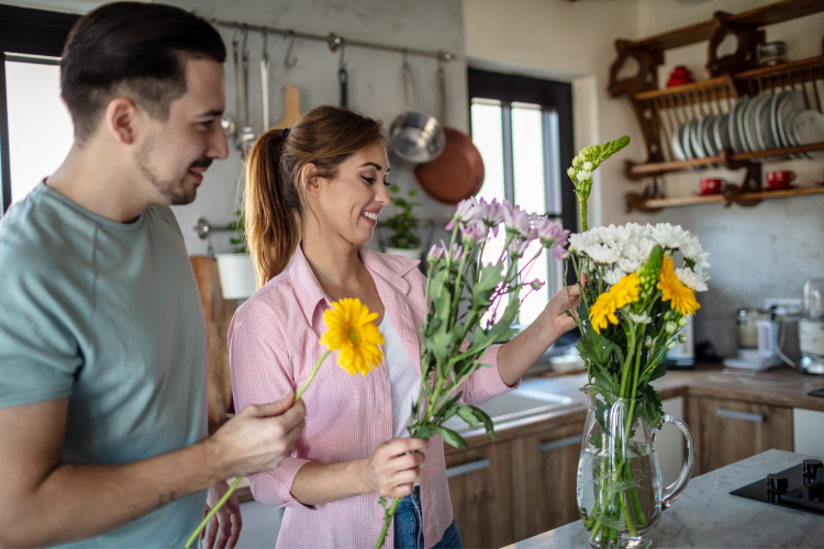 couple arranging flowers as date idea in San Antonio