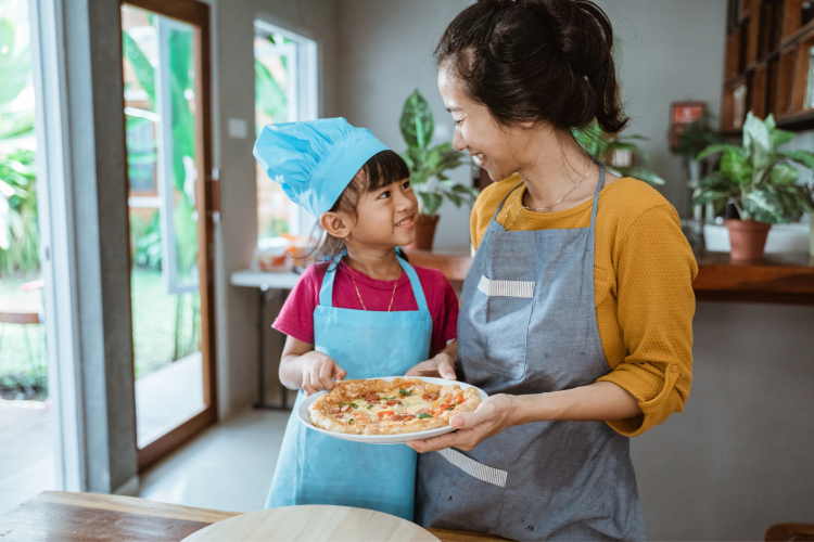 kid making pizza as after-school activity
