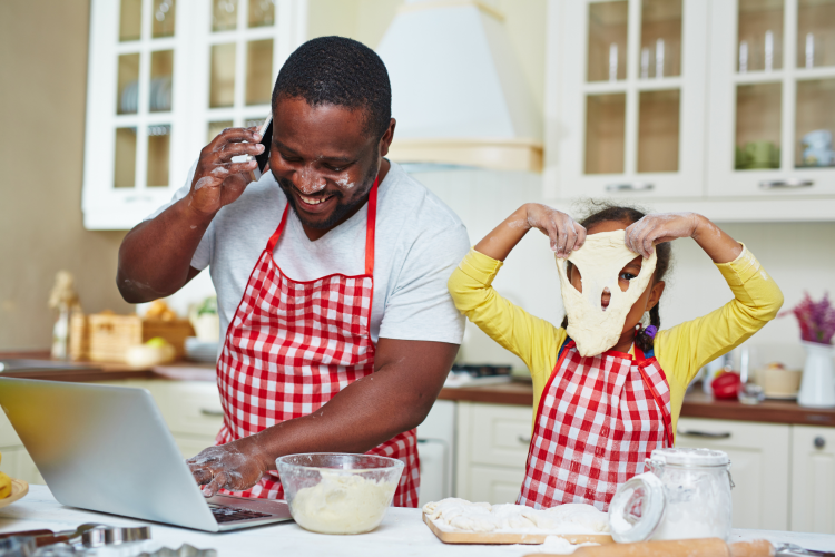father and kid cooking