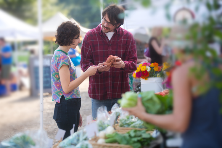 adults at farmers market