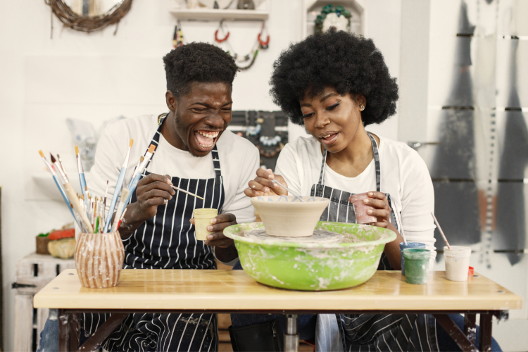 Couple at pottery class for date idea in Dallas