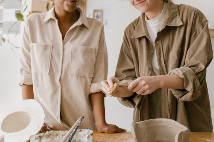 molding types of clay in pottery making class