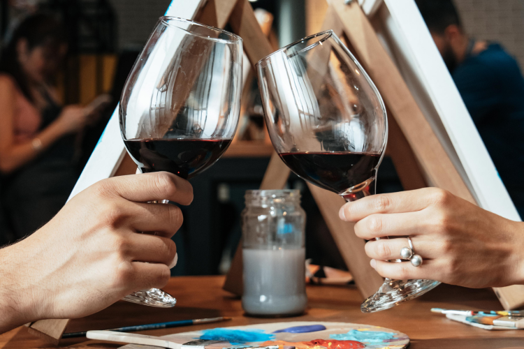 couple sip and paint