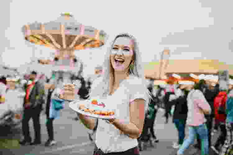 Eating food at a fair
