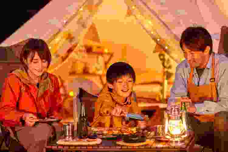 Camping under fairy lights