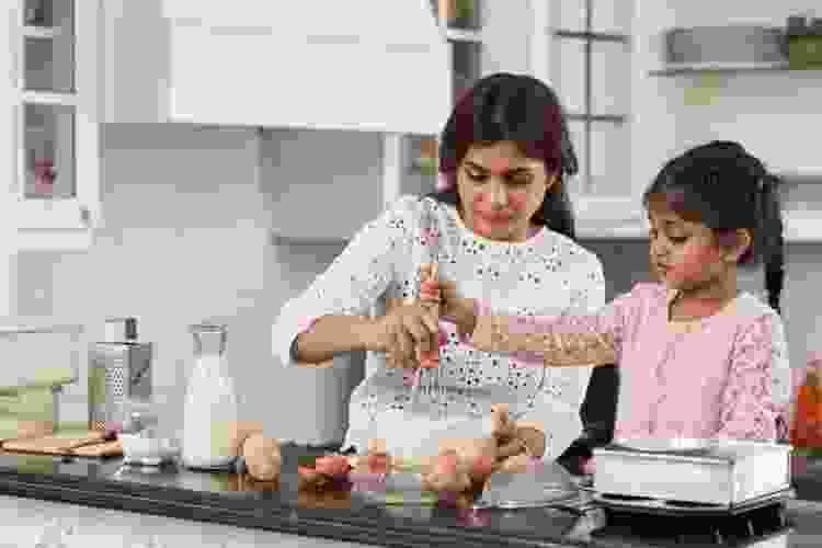 Child helping to cook