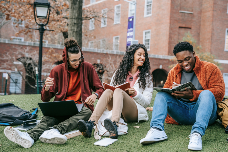 Diverse group of students sitting and laughing