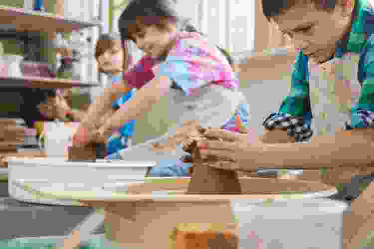Kids in pottery class