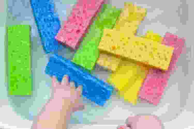 water and sponge sensory bin