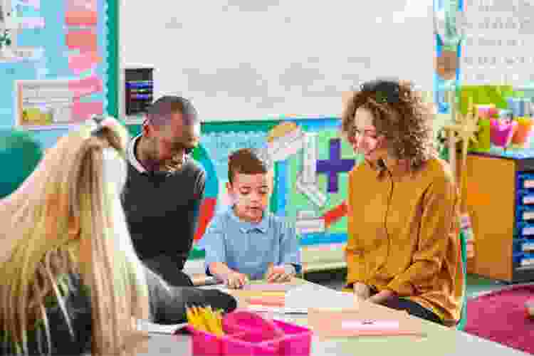 Parents meeting with teacher