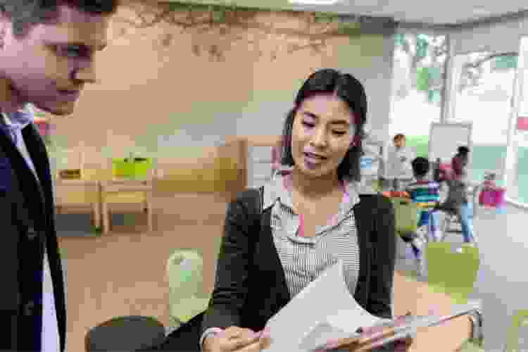 Parent talking to teacher