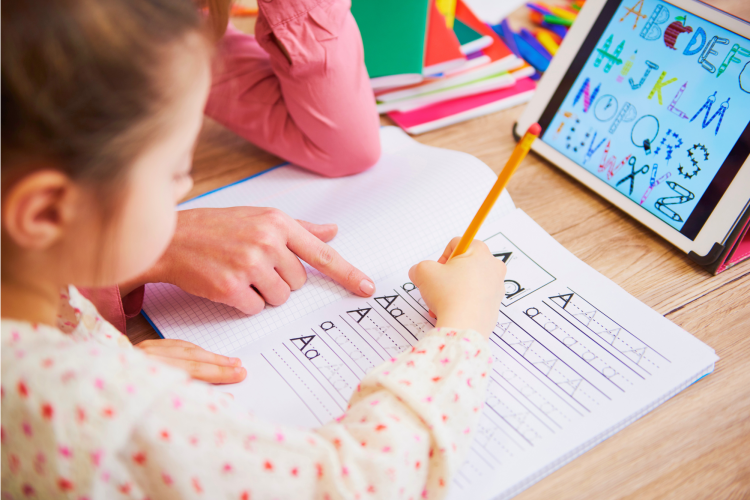 girl studying with a tablet