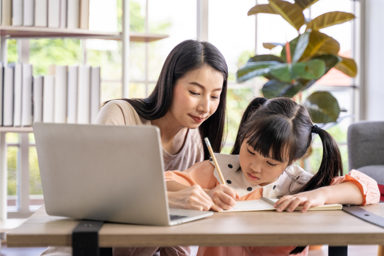 mom studying with her daughter