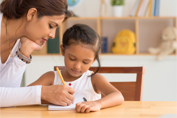 Mom with her kid doing homework