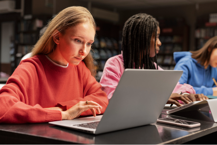 Girl Studying in group during summer program for high school students