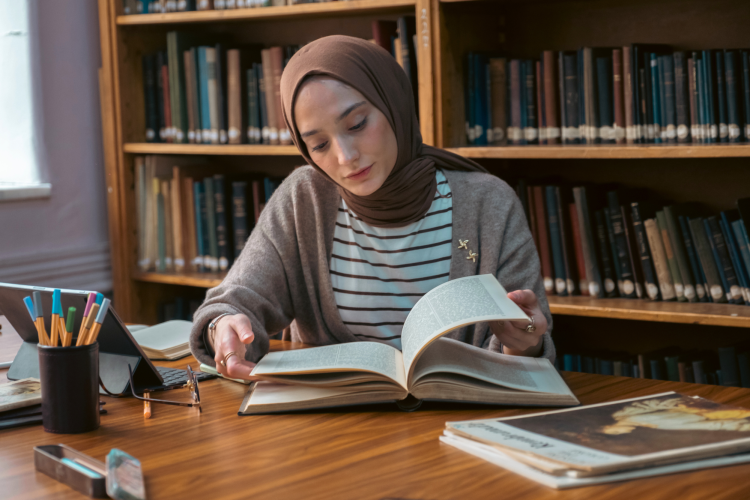 Female Student using library as place to study